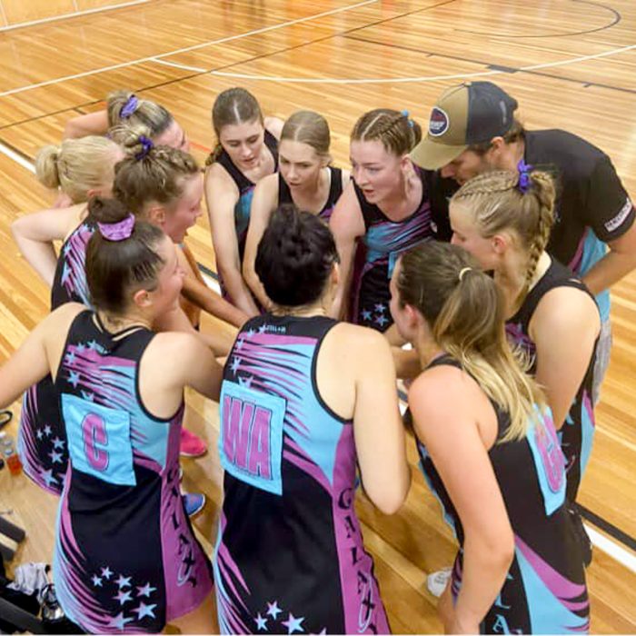 Galaxy Netball Club Players huddled before Game