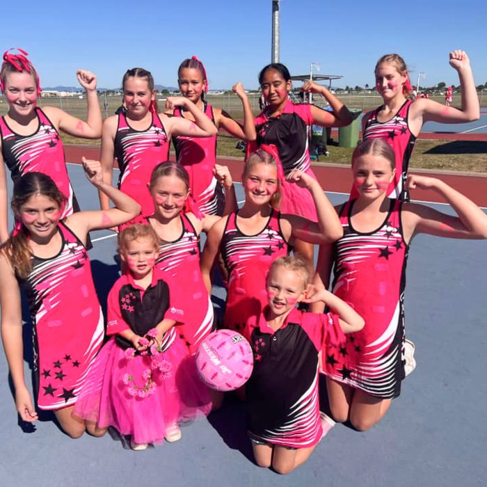 Galaxy Netball Club Team Photo in Pink for Breast Cancer Awareness